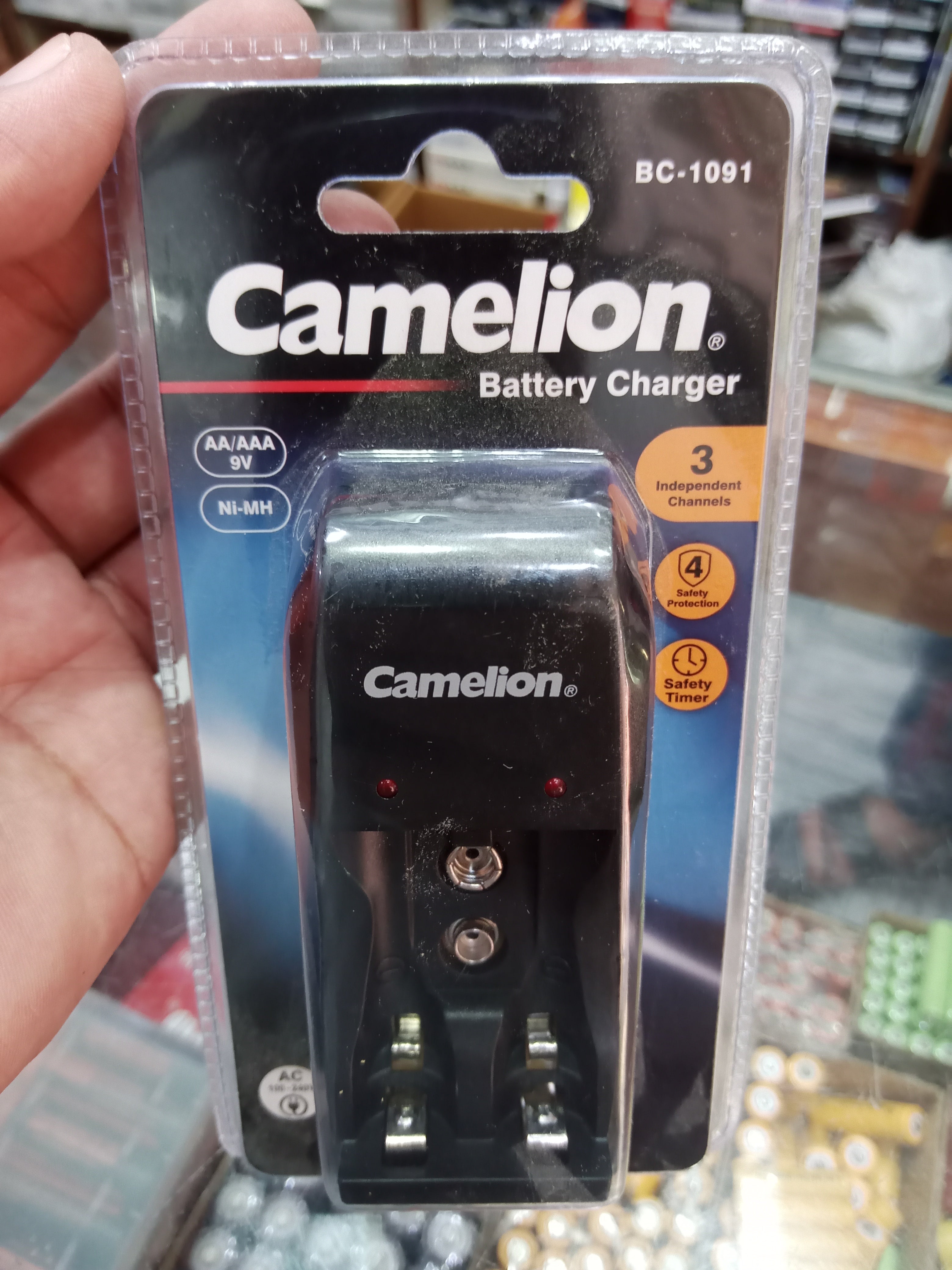 Camelion BC-1091 and BC-1010B Auto Cutt off Charging Ni-MH Battery Charger with 3 & 4 slots & Safety Timer (AA/AAA/9V)Camelion  AA/AAA Ni-MH Rechargeable Battery Charger