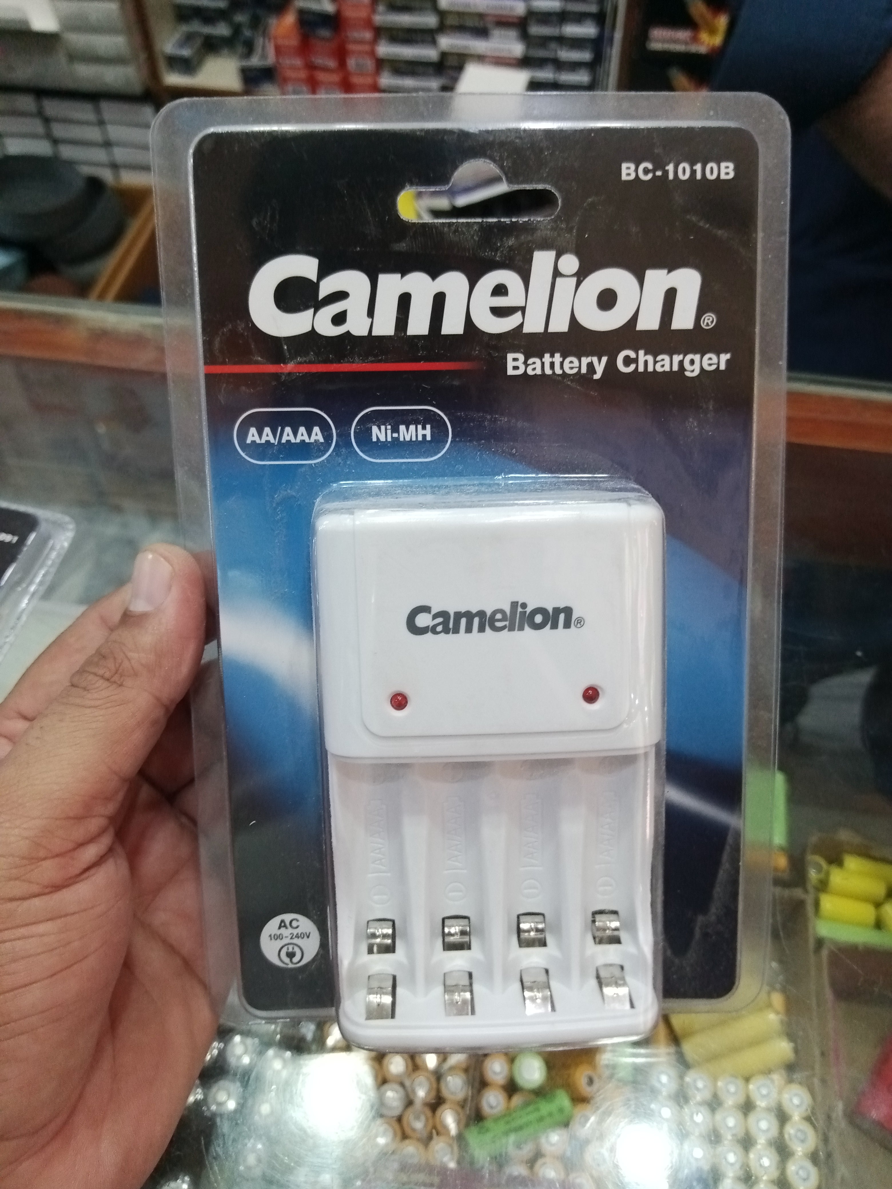 Camelion BC-1091 and BC-1010B Auto Cutt off Charging Ni-MH Battery Charger with 3 & 4 slots & Safety Timer (AA/AAA/9V)Camelion  AA/AAA Ni-MH Rechargeable Battery Charger